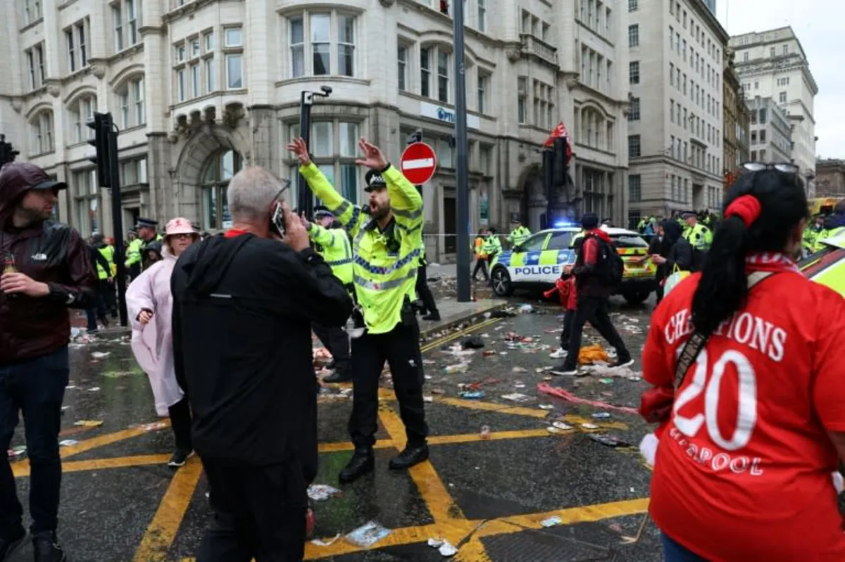 Liverpool fans 'devastated' as title glory marred by tragedy